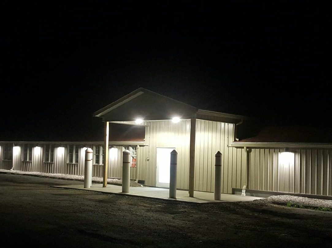 Well-lit storage facility at night